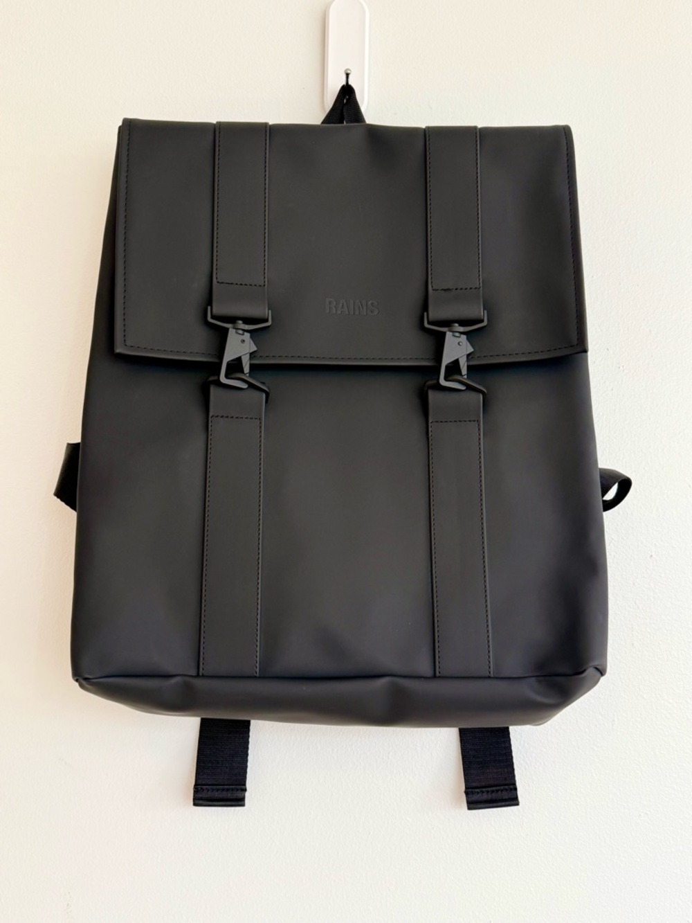 RAINS Black Waterproof Backpack with Front Buckles — Minimal chic! LIKE NEW!!